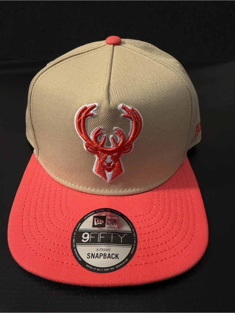Milwaukee Bucks New Era Men’s Beige and Coral Snapback Hat
